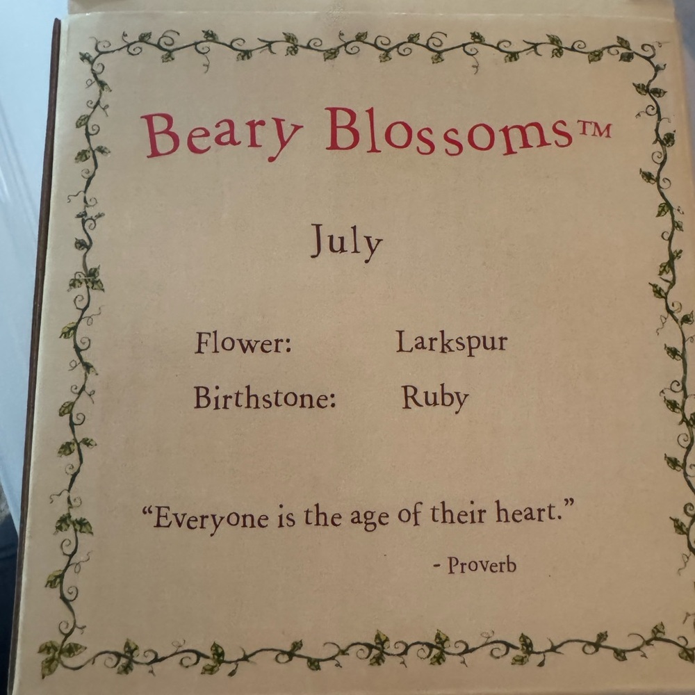 The Boyds Bears Beary Blossoms July Bloom figurine